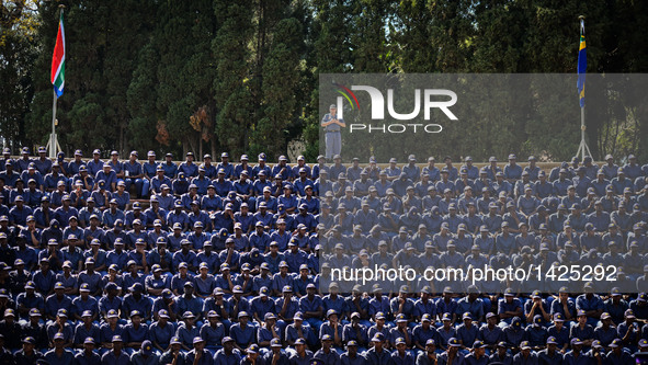 A South African police officer (C, back) and cadets attend the commemoration for 40 deceased police officers in Pretoria, South Africa, Sept...