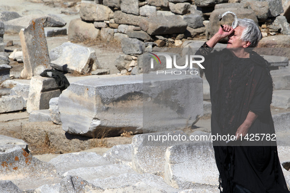 Greek actress Despina Bebedeli plays the leading role in a performance of "Hecuba (Ekavi), A Refugee on Delos", at the ruins of the ancient...