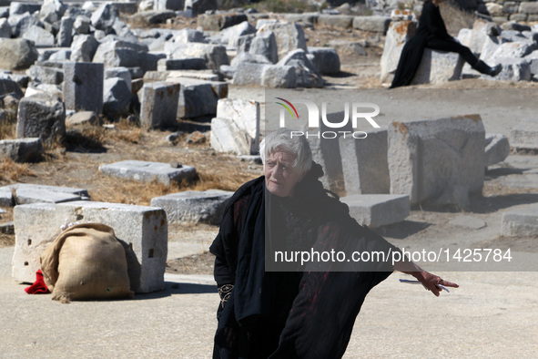 Greek actress Despina Bebedeli plays the leading role in a performance of "Hecuba (Ekavi), A Refugee on Delos", at the ruins of the ancient...