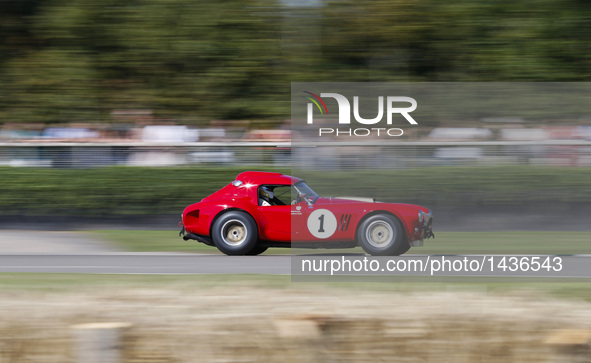 A vintage race car takes part in a race at the Goodwood Revival 2016 in Goodwood, south England, Sept. 11, 2016.