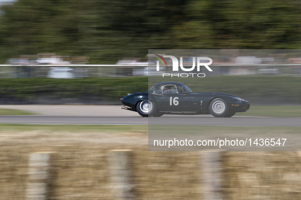 A vintage race car takes part in a race at the Goodwood Revival 2016 in Goodwood, south England, Sept. 11, 2016.