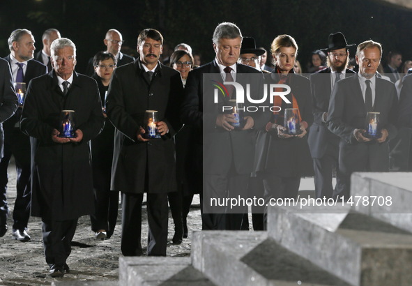 Ukrainian President Petro Poroshenko (Front C) attends a ceremony commemorating the massacre of about 150,000 Nazi victims in Babi Yar near...