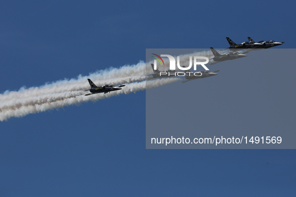 The French Breitling Jet Team perform in an air show in San Francisco, the United States, on Oct. 8, 2016. An air show featuring the U.S. Na...