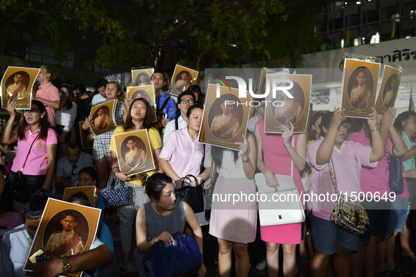 People mourn for the death of Thai King Bhumibol Adulyadej outside Siriraj Hospital in Bangkok, capital of Thailand, on Oct. 13, 2016. Thai...