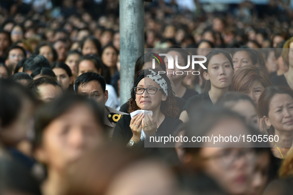 A woman mourns for Thai King Bhumibol Adulyadej near the Grand Palace in Bangkok, Thailand, on Oct. 14, 2016. The remains of Thai King Bhumi...