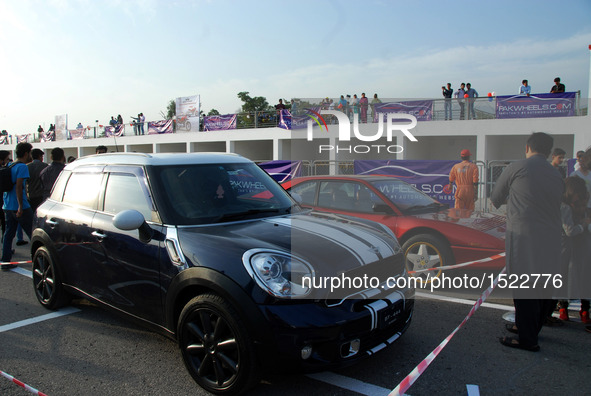 People visit a car show in Islamabad, capital of Pakistan on Oct. 23, 2016. The Islamabad Auto Show 2016, orchestrated by PakWheels, made a...