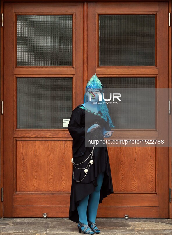 A cosplayer visits the Frankfurt Book Fair in Frankfurt, Germany, on Oct. 23, 2016. The finale of the 10th German Cosplay Championship concl...