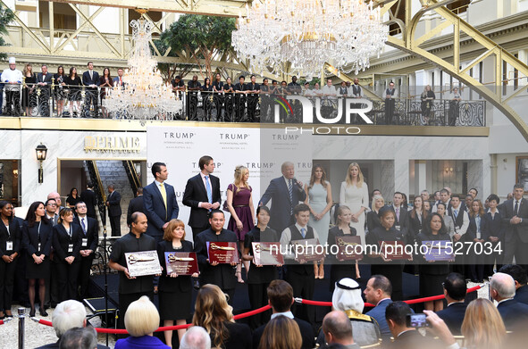 U.S. Republican presidential nominee Donald Trump and his family members attend the opening and ribbon cutting ceremony of Trump Internation...