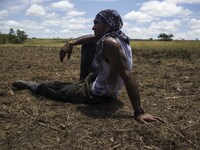 Guerrillas from FARC EP rest from their daily labours with a soccer game in Llanos del Yari, a town in an Indigenous region of southern Colo...