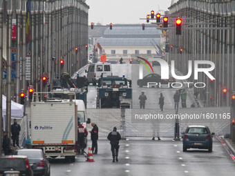 A security perimeter fence stands on Wetstraat in Brussels, Belgium, on March 23, 2016. Police continue investigations after yesterday's exp...