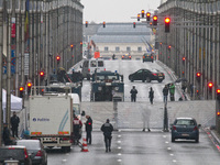 A security perimeter fence stands on Wetstraat in Brussels, Belgium, on March 23, 2016. Police continue investigations after yesterday's exp...