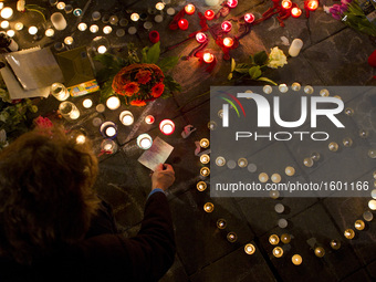 People gather in Paris, on March 22, 2016, for a tribute to the victims of Brussels following triple bomb attacks in the Belgian capital tha...