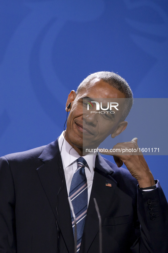 US President Barack Obama is pictured during a news conference held with German Chancellor Angela Merkel (not in the picture) at the Chancel...