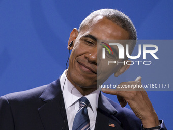 US President Barack Obama is pictured during a news conference held with German Chancellor Angela Merkel (not in the picture) at the Chancel...