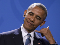 US President Barack Obama is pictured during a news conference held with German Chancellor Angela Merkel (not in the picture) at the Chancel...