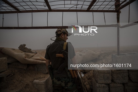 A member of the Peshmerga, the Kurdistan Regional Government’s fighting forces, along the frontline in Makhmour, Iraq, on May 18, 2016. Makh...