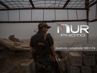 A member of the Peshmerga, the Kurdistan Regional Government’s fighting forces, along the frontline in Makhmour, Iraq, on May 18, 2016. Makh...