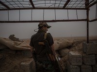 A member of the Peshmerga, the Kurdistan Regional Government’s fighting forces, along the frontline in Makhmour, Iraq, on May 18, 2016. Makh...