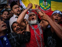 A Rohingya Muslim in Malaysia chain himself during  'Stop the Oppression of  Rohingya' assembly outside Myanmar Embassy in Kuala Lumpur on N...