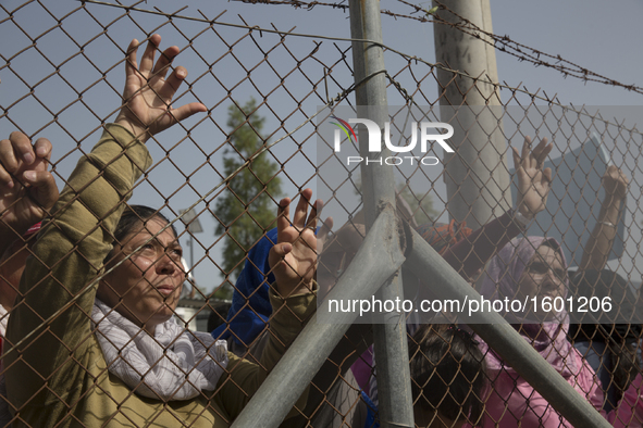 Lesvos, Greece-- June 18, 2016-- Afghans, Syrians and Yazidis protest during UN Secretary General Bank Ki-moon's visit to Kara Tepe refugee...