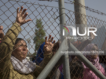 Lesvos, Greece-- June 18, 2016-- Afghans, Syrians and Yazidis protest during UN Secretary General Bank Ki-moon's visit to Kara Tepe refugee...