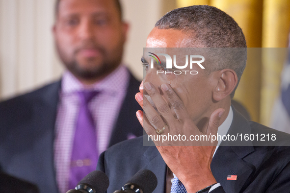 US President Barack Obama gets emotional as he speaks on reducing gun violence in the East Room of the White House on January 5, 2016 in Was...