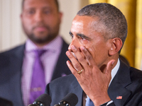 US President Barack Obama gets emotional as he speaks on reducing gun violence in the East Room of the White House on January 5, 2016 in Was...