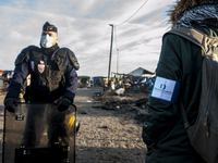 Advocates access the Calais jungle. Police block access, but they come to pass, in Calais, October 27, 2016.
The Calais jungle begins its fo...