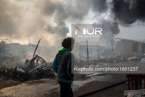 Chaotic scenes of the jungle as the camp is evacuated, because of the danger from all the fires in Calais, France on 26 October 2016. Around...