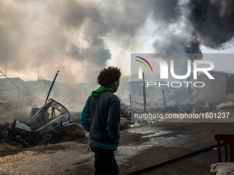 Chaotic scenes of the jungle as the camp is evacuated, because of the danger from all the fires in Calais, France on 26 October 2016. Around...