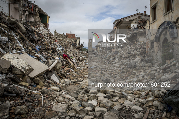 A picture taken on October 11, 2016 shows destruction in the village of Amatrice. Nearly 300 people died in the quake of August 24, 2016 and...