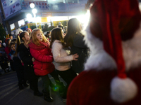 Children having fun at Christmas party with Santa Clause at te centre of the Bulgarian border town of Svilengrad, which is located, some 260...