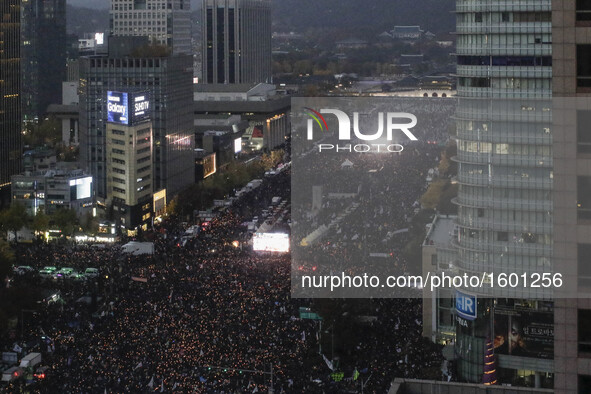 About Million protesters shout slogans during a anti-President protest near President Blue House in Seoul, South Korea, on 12 November 2016....