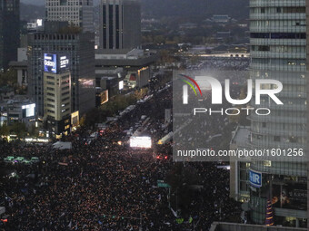 About Million protesters shout slogans during a anti-President protest near President Blue House in Seoul, South Korea, on 12 November 2016....