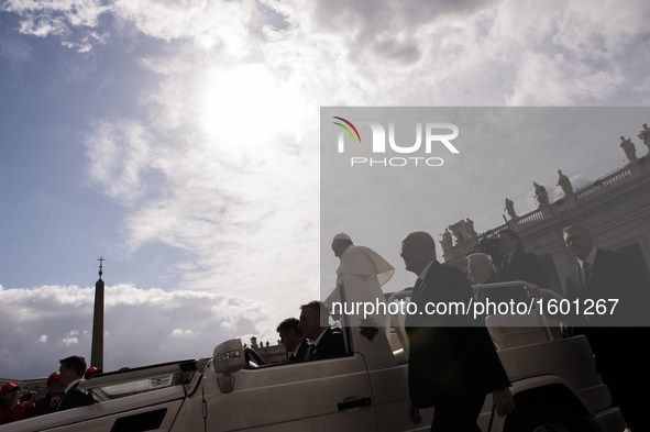 Pope Francis arrives for his weekly general audience in St. Peter's Square at the Vatican, Wednesday, April 27, 2016. 