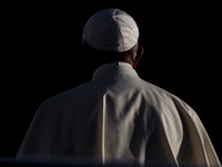 Pope Francis leads a prayer with representatives of different religions inside the Basilica of St. Francis, in Assisi, Italy, Tuesday, Sept....