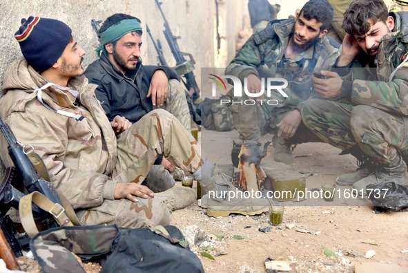 Soldiers of pro-government militia rest in Aleppo, Syria, on Dec. 11, 2016. The Syrian army and allied fighters are now in control of 98 per...