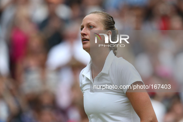 (140705) -- LONDON, July 5, 2014 () -- Czech Republic's Petra Kvitova walks to the stand after the women's singles final match against Canad...
