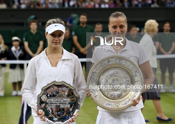 (140705) -- LONDON, July 5, 2014 () -- Czech Republic's Petra Kvitova (front R) and Canada's Eugenie Bouchard pose with their trophies durin...