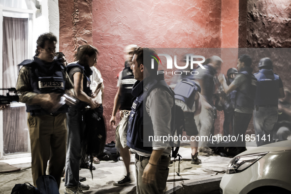 Journalists gather in front of Al Deira hotel after most of the so called Beach Hotels in Gaza city had to be evacuated because of the begin...