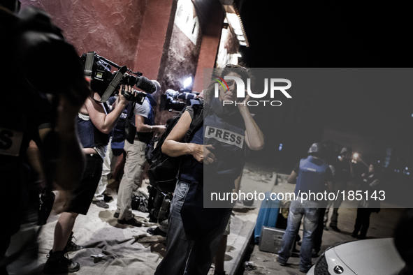 Journalists gather in front of Al Deira hotel after most of the so called Beach Hotels in Gaza city had to be evacuated because of the begin...