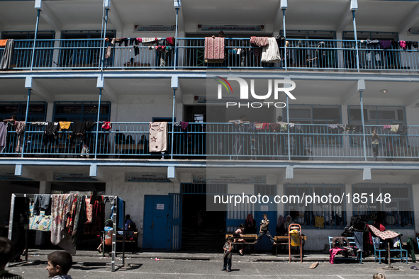 A make-shift refugee camp in Betlehia, Gaza on July 18th, 2014. The former school currently holds approximately 3500 Palestinian. According...