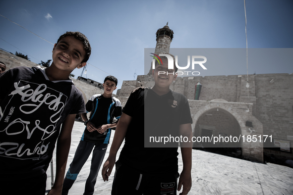 Children in front of the Great Mosque of Gaza in Gaza City before Friday prayers on July 18th, 2014.