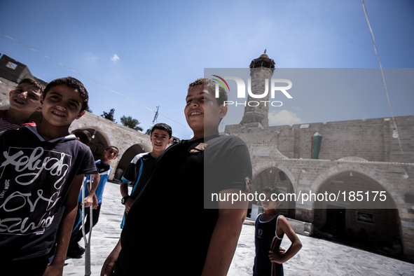 Children in front of the Great Mosque of Gaza in Gaza City before Friday prayers on July 18th, 2014.