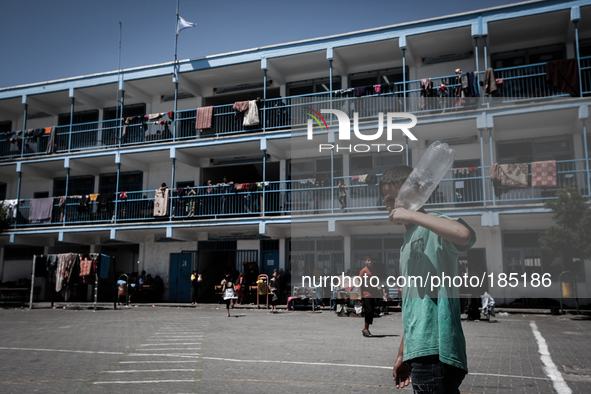 A make-shift refugee camp in Jabalya, Gaza on July 18th, 2014. The former school currently holds approximately 3500 Palestinian. According t...