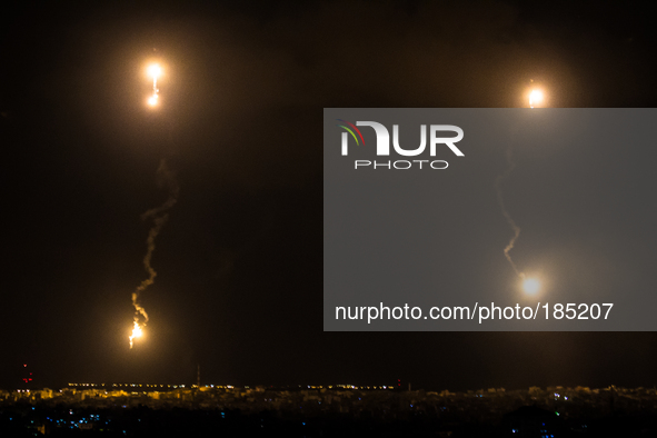 Israeli Defense Forces (IDF) firing flares to illuminate the landscape during the second night of the ground invasion on July 19th, 2014.