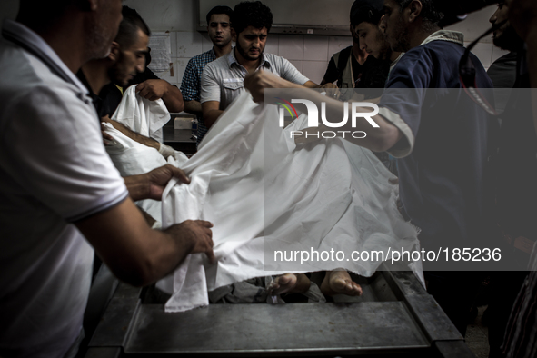 The dead bodies of two children (5 and 9 years) that died during tank shellings in the morning hours of July 20th inside the Central Morgue...