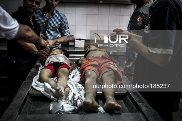 The dead bodies of two children (5 and 9 years) that died during tank shellings in the morning hours of July 20th inside the Central Morgue...