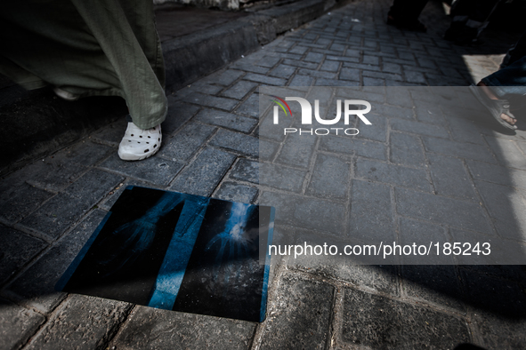 An X-Ray photograph dropped on the floor in front of the Central Morgue in Gaza City which has been crowded since Israeli attacks on Gaza in...