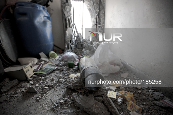 A tank shell that killed two children (5 an 9 years) inside their home on July 20th, 2014 in Gaza City.